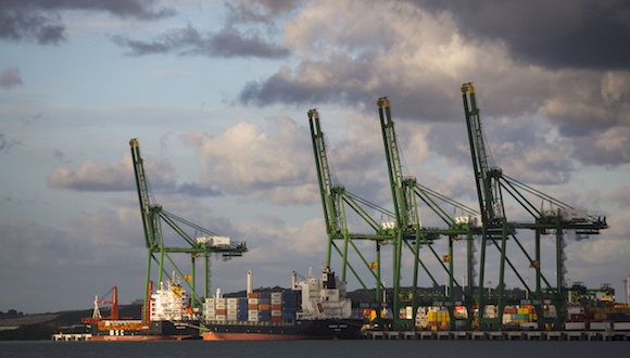 Ships are seen moored at the container terminal of the port of the Mariel special economic development zone across the bay of Mariel near Havana, Cuba, Tuesday, Jan. 5, 2016. Virginia Governor Terry McAuliffe is on a two-day visit to Cuba with a delegation of businessmen exploring trade opportunities between the U.S. state of Virginia and Cuba. (AP Photo/Desmond Boylan)