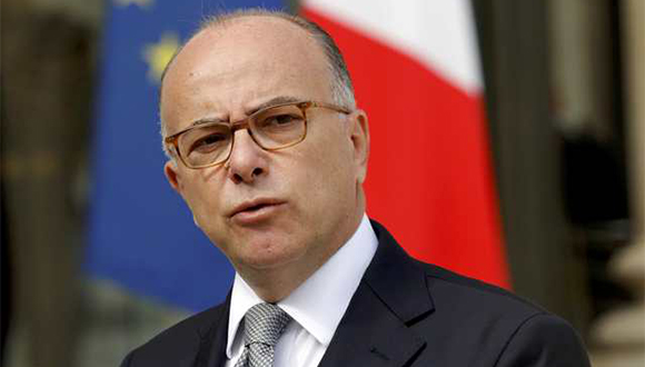 French Interior Minister Bernard Cazeneuve speaks in the Elysee Palace courtyard in this picutre taken August 11, 2016 in Paris, France.  Picture taken August 11, 2016.  REUTERS/Philippe Wojazer/File Photo