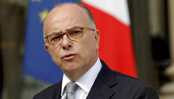 French Interior Minister Bernard Cazeneuve speaks in the Elysee Palace courtyard in this picutre taken August 11, 2016 in Paris, France. Picture taken August 11, 2016. REUTERS/Philippe Wojazer/File Photo