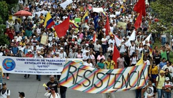Manifestantes marchan contra el gobierno del presidente colombiano, Iván Duque, durante un paro nacional en Cali, Colombia, el 27 de noviembre de 2019. Foto: AFP.