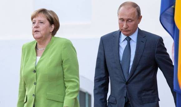 Vladimir Putin y Angela Merkel. Foto: Getty Images.