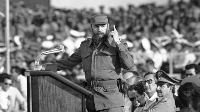 Cuban President Fidel Castro speaks to a military gathering on the 20th anniversary of the failure of the Bay of Pigs Invasion, Thursday, April 17, 1981, Havana, Cuba. Fidel spoke to the 60,000 soldiers present, telling them to be ready to die for Cuba’s communist revolution. (AP Photo/Charles Tasnadi)