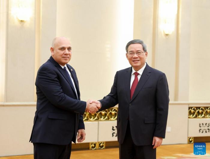 Primer ministro chino se reúne con la delegación de Partido Comunista de Cuba // Foto: XINHUA