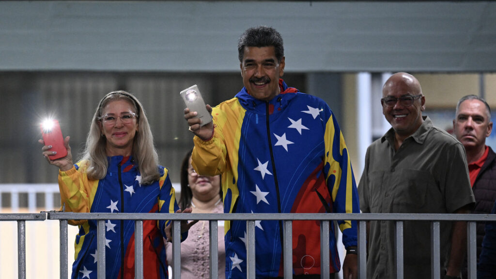 Cilia Flores, Nicolás Maduro y Jorge Rodríguez en Caracas, 28 de julio del 2024.Juan Barreto / AFP